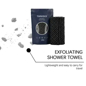 Detailed macro view of TORVIKX exfoliating shower towel with dark blue travel pouch bag