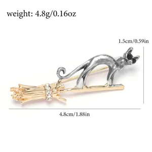 Detailed view of flying broom cat brooch with weight and size dimensions