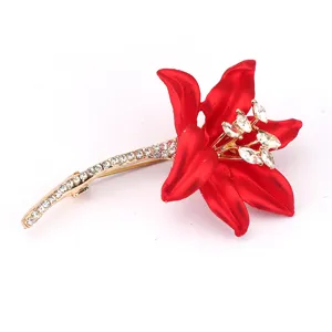 Elegant red flower brooch with sparkling crystals and gold-tone finish for ladies
