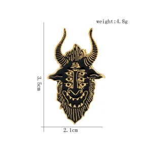 Black and gold enamel demon pin with multiple eyes, size 3.5x2.1cm and 4.8g weight