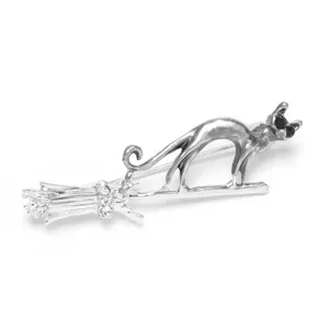 Elegant silver-tone flying broom cat brooch with sparkling crystal and black gem eyes