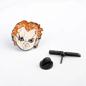 Detail view of Chucky doll head enamel pin with secure metal backings