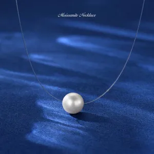 Elegant single white freshwater pearl pendant on an invisible thin silver chain