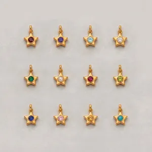 Twelve gold-plated star pendants featuring different colored birthstones for each month.