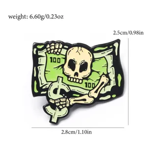 Broche en émail métallique motif crâne et billet de un dollar avec ses dimensions
