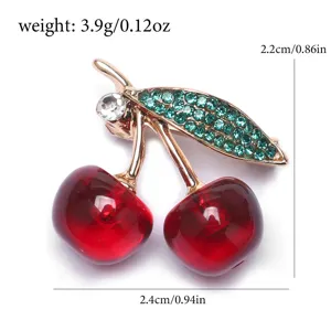 Vue détaillée du broche cerise créatif avec des mesures de poids et de dimensions