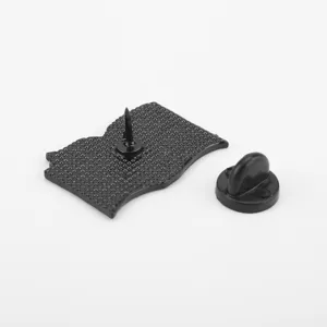 Detailed back view of creative brooch pin showing metal needle and black rubber clutch