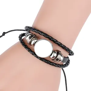 Vue détaillée du bracelet en cuir tressé noir avec support de lunette ronde de 18 mm.