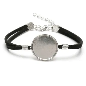 Close-up view of a 20mm DIY bracelet base with black velvet cord and silver alloy tray