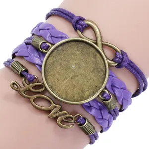 Close-up of handmade purple multi-layer braided bracelet with round bezel and Love charm