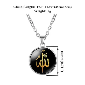 Close-up of Middle Eastern style glass gem pendant with gold Allah calligraphy on black.