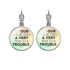 Macro view of silver leverback earrings with Psalm 46:1 scripture pendant detail