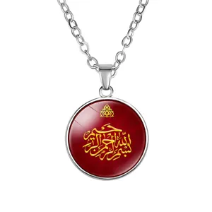 Close-up of time gem pendant necklace with red Arabic calligraphy design on silver chain