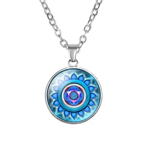 Close-up of 18mm yoga chakra pendant necklace with blue mandala design