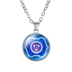 Macro view of an 18mm yoga pendant necklace with a detailed blue chakra symbol.