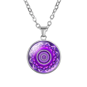 Detail view of 18mm yoga pendant necklace with purple mandala design under glass.