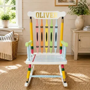 Detailed view of personalized gold vinyl letter stickers on a colorful wooden chair