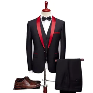 Three-piece men's slim fit suit with red shawl lapel, vest, trousers and bow tie