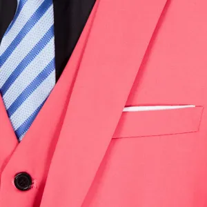 Close-up of coral pink slim fit men's wedding suit with striped tie and black shirt