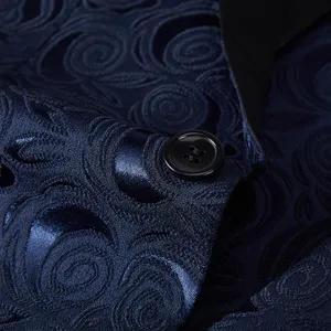 Close-up of men's slim fit suit in navy blue rose jacquard fabric showing fabric texture