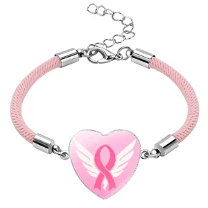 Close-up of pink ribbon heart charm on woven bracelet for Breast Cancer Awareness