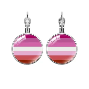 Detailed view of silver French lever-back earrings with lesbian pride flag pattern