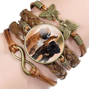 Close-up detail of multi-layer braided leather bracelet with Boxer dog photo gem