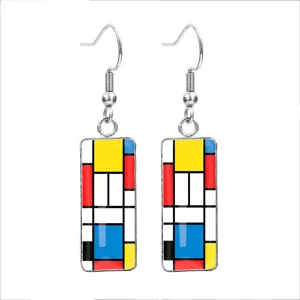 Close-up of Mondrian-style geometric rectangular earrings with colorful block patterns