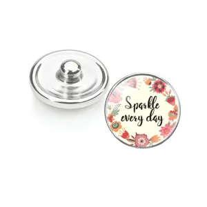 Boutons pression en verre fleuris avec texte Sparkle every day et détails du dos
