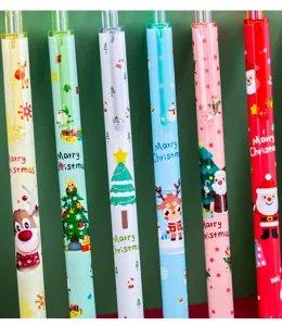 Close-up of colorful Christmas gel pens featuring cute Santa and reindeer designs.