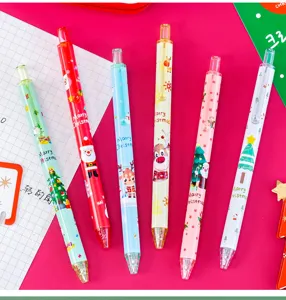 Set of Christmas-themed gel pens featuring Santa and reindeer designs on pink background.