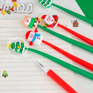 Christmas themed cartoon silicone gel pens with festive characters on a notebook.