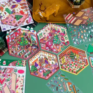 Vista dettagliata di adesivi 3D per case di dolci natalizi per decorazioni di diari fai-da-te.