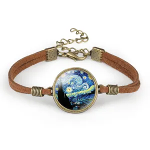 Detailed view of Van Gogh's Starry Night painting in a glass dome on a suede rope bracelet.