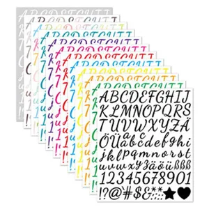 Close-up of diverse colorful alphabet and number sticker sheets for creative DIY labeling