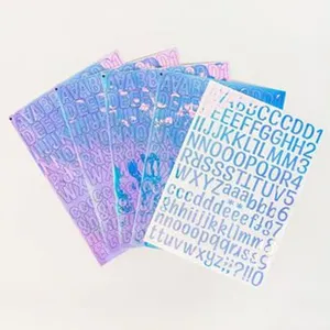 Close-up of holographic metallic vinyl alphabet and number stickers for decoration