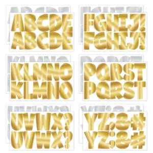 Detailed macro view showing golden metallic alphabet and symbol stickers for DIY labels