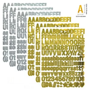 Detail showing gold and silver metallic alphabet and number stickers with size info
