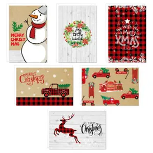 Detailed view of festive Christmas stickers featuring red trucks and reindeer designs.