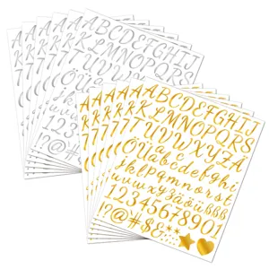 Detailed macro shot of gold and silver metallic letter and number stickers