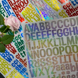Detailed view of colorful holographic laser alphabet stickers for DIY craft projects