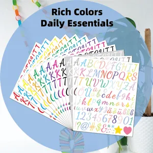 Detailed view of colorful 1-inch vinyl German alphabet and number sticker sheets for DIY