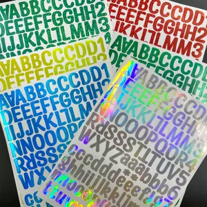 Detailed macro view of multi-colored holographic glitter alphabet and number stickers