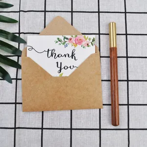 Elegant floral Thank You greeting card set with a rustic kraft envelope and vintage pen