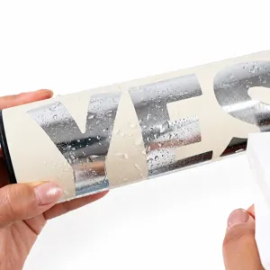 Close-up of waterproof silver chrome letter stickers with shiny metallic finish