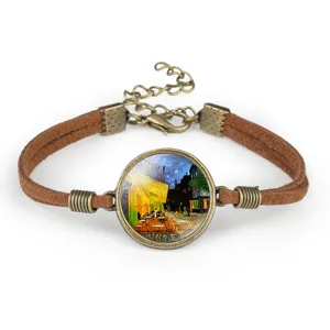 Close-up of Van Gogh Cafe Terrace at Night time gem pendant on brown cord bracelet