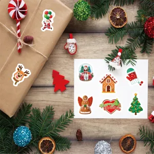 Decorative Christmas stickers applied on a gift box and card in a festive setting