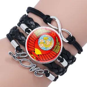 Multi-layer black leather bracelet with USSR emblem glass cabochon and metal charms.