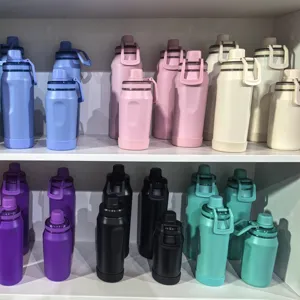Gran colección de botellas de agua térmicas de acero inoxidable 304 con cómodas asas