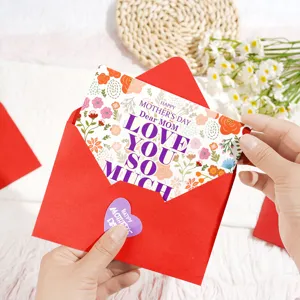 Detail of Mother's Day floral greeting card with red envelope and heart sticker